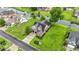 Aerial view of a home with a canal, lush lawn, and mature trees at 1106 Bluffton Ct., Myrtle Beach, SC 29579