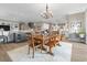 Bright dining room with a chandelier, seamlessly connects to the kitchen and living spaces at 1106 Bluffton Ct., Myrtle Beach, SC 29579