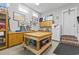 Workshop area within the garage, featuring a workbench, cabinetry, and additional storage solutions at 1106 Bluffton Ct., Myrtle Beach, SC 29579
