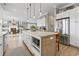 Open concept kitchen boasts a spacious island with pendant lighting and stainless steel appliances at 1106 Bluffton Ct., Myrtle Beach, SC 29579