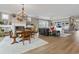 Open-concept dining and living area featuring hardwood floors and recessed lighting at 1106 Bluffton Ct., Myrtle Beach, SC 29579