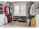 Spacious walk-in closet with custom shelving, ample storage for clothes and shoes, and a window at 1106 Bluffton Ct., Myrtle Beach, SC 29579