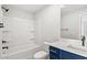 Updated bathroom features modern fixtures, a tub, and a sleek vanity with a sink at 1201 Crooked Hook Rd., North Myrtle Beach, SC 29582