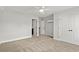 Bright, neutral bedroom with carpet, a ceiling fan and two large closets at 1201 Crooked Hook Rd., North Myrtle Beach, SC 29582