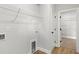 Laundry room with ample storage space with easy access to storage and wire shelving at 1201 Crooked Hook Rd., North Myrtle Beach, SC 29582