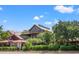 Rustic House of Blues building with charming outdoor areas, nestled among lush greenery and promising a vibrant atmosphere at 1201 Crooked Hook Rd., North Myrtle Beach, SC 29582