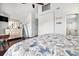 Bright bedroom with a floral bedspread and a beachy, relaxing decor at 121B 7Th Ave. S, Surfside Beach, SC 29575