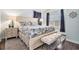 Serene bedroom with a large bed, stylish bedding, and plenty of natural light at 121B 7Th Ave. S, Surfside Beach, SC 29575