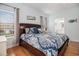 Well-lit bedroom with an en-suite bathroom and a relaxing beach themed decor at 121B 7Th Ave. S, Surfside Beach, SC 29575