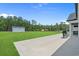 Spacious backyard featuring a large metal storage shed, perfect for outdoor activities and storage at 1253 Kenworth Circle, Conway, SC 29526