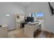 Office area with a modern desk setup, ample storage, and large windows providing natural light at 1253 Kenworth Circle, Conway, SC 29526