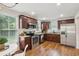Modern kitchen with stainless steel appliances, granite countertops, and plenty of cabinet space at 126 Cleland St., Georgetown, SC 29440