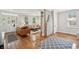Spacious living room with hardwood floors, exposed support column, and bright natural lighting at 126 Cleland St., Georgetown, SC 29440
