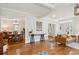 Open-concept living space featuring hardwood floors connecting the dining and living areas at 126 Cleland St., Georgetown, SC 29440