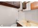 Compact bathroom with a toilet, sink, vanity mirror, and basic fixtures at 1272 Park Hill Dr., Conway, SC 29526