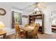 Dining room with table, chairs, and ceiling fan next to a window providing natural light at 1272 Park Hill Dr., Conway, SC 29526
