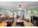 Spacious living room seamlessly connects to the kitchen, offering an open and inviting atmosphere at 1272 Park Hill Dr., Conway, SC 29526