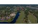 Stunning aerial view of a home with waterfront access near a golf course and city skyline at 1503 Cadiz Dr., Myrtle Beach, SC 29579