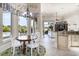 Bright dining area adjacent to the kitchen with a backyard and pool view at 1503 Cadiz Dr., Myrtle Beach, SC 29579