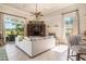 Inviting living room with a fireplace, entertainment center, and large windows at 1503 Cadiz Dr., Myrtle Beach, SC 29579
