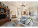 Cozy living room open to kitchen with fireplace, TV, and comfortable seating at 1503 Cadiz Dr., Myrtle Beach, SC 29579