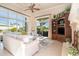 Comfortable living room with large windows and a view of the outdoor area at 1503 Cadiz Dr., Myrtle Beach, SC 29579