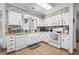 Bright kitchen with white cabinets, brick backsplash, and modern appliances for a functional cooking space at 1546 Bay Tree Ln., Myrtle Beach, SC 29575