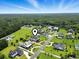 Aerial view of luxury neighborhood and spacious property featuring verdant landscaping and picturesque setting at 157 Pottery Landing Dr., Conway, SC 29526