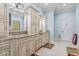 Spacious bathroom featuring granite countertops, bright cabinets, and lots of storage space at 157 Pottery Landing Dr., Conway, SC 29526