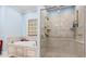 Luxurious bathroom with soaking tub and walk-in shower with glass door at 157 Pottery Landing Dr., Conway, SC 29526
