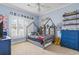 Charming bedroom with blue walls, carpet, a ceiling fan and unique canopy bed with decor at 157 Pottery Landing Dr., Conway, SC 29526