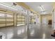 Spacious three car garage with room for parking and storage with access door to the main living area at 157 Pottery Landing Dr., Conway, SC 29526