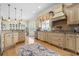 Gourmet kitchen with custom cabinets, granite countertops, and stainless-steel appliances at 157 Pottery Landing Dr., Conway, SC 29526