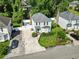 Aerial view of the home and surrounding neighborhood, showcasing mature trees and curb appeal at 1575 Victoria Ln., Myrtle Beach, SC 29577