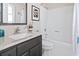 This full bath boasts a shower-tub combo, modern fixtures, and a sleek vanity at 1575 Victoria Ln., Myrtle Beach, SC 29577