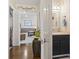 Stylish half bath features modern vanity, framed mirror, and convenient access to the living area at 1575 Victoria Ln., Myrtle Beach, SC 29577