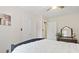 Bright bedroom features a dark wood bed frame, closet and a ceiling fan at 1575 Victoria Ln., Myrtle Beach, SC 29577