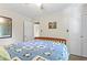 Comfortable bedroom with wood frame bed, large closet, and inviting decor at 1575 Victoria Ln., Myrtle Beach, SC 29577