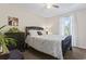 Well-lit bedroom offering a dark dresser, a window with curtains, and plush carpeting at 1575 Victoria Ln., Myrtle Beach, SC 29577