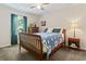Cozy bedroom featuring natural light, wood frame bed and a spacious closet at 1575 Victoria Ln., Myrtle Beach, SC 29577
