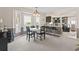 Bright dining area with a bay window and view into the kitchen, ideal for Gathering meals at 1575 Victoria Ln., Myrtle Beach, SC 29577
