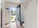 Bright foyer featuring hardwood floors, a decorative front door, and a view of the outdoors at 1575 Victoria Ln., Myrtle Beach, SC 29577