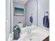 Modern bathroom with white sink and vanity, chrome fixtures, and a large mirror at 158 Palisade Loop # 158, Pawleys Island, SC 29585