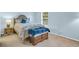 Comfortable bedroom with a queen-sized bed, side table, and storage chest at 158 Palisade Loop # 158, Pawleys Island, SC 29585