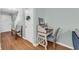 Hallway with wooden floors, staircase, and desk with chair at 158 Palisade Loop # 158, Pawleys Island, SC 29585