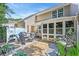 Paver patio with outdoor seating, grill, and views of the house at 158 Palisade Loop # 158, Pawleys Island, SC 29585