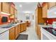 Well-equipped kitchen offering ample counter space and cabinetry that connects to the living area at 160 Lazy Willow Ln. # 202, Myrtle Beach, SC 29588