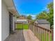 Back deck leading to a spacious yard with an additional shed for storage at 175 Cypress Ln., Little River, SC 29566
