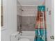 Bathroom featuring a tub and shower combo with a stylish shower curtain at 175 Cypress Ln., Little River, SC 29566
