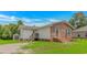 Charming single story home with brick accents, metal roof, and well-maintained lawn and shed at 175 Cypress Ln., Little River, SC 29566